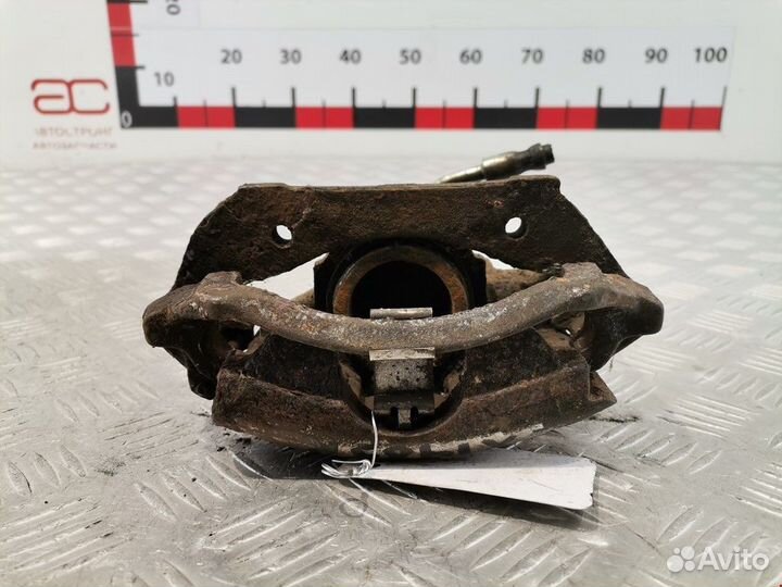 Суппорт передний правый Ford Escort 5 2-й рест