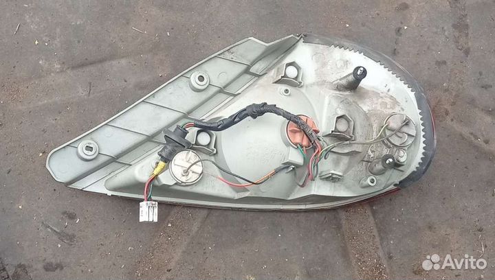 Фонарь задний левый на Kia Spectra