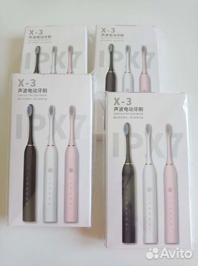 Электрическая зубная щетка новая