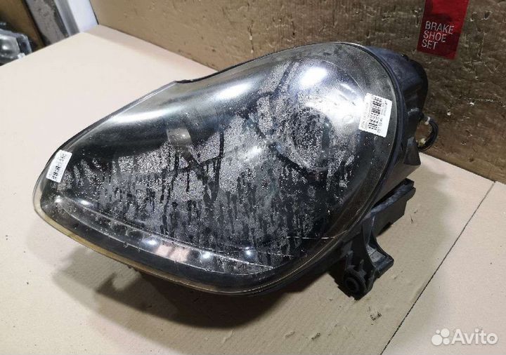 Фара левая Porsche Cayenne955