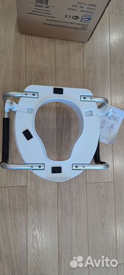 Сиденье для унитаза с поручнями