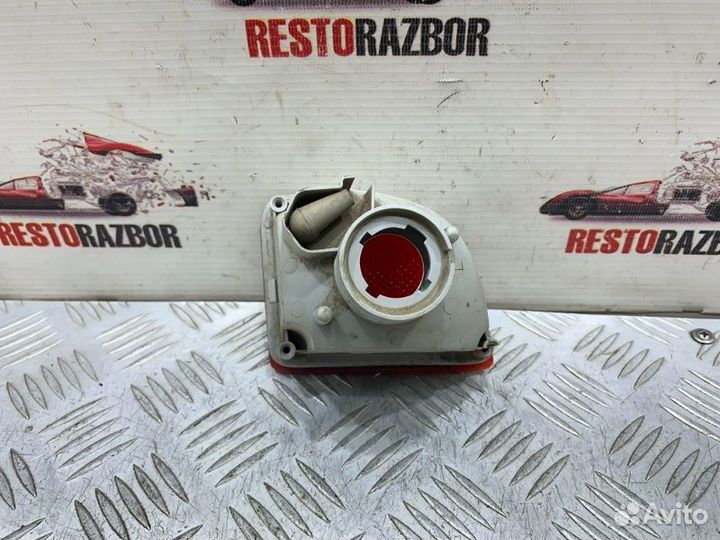 Фонарь противотуманный задний левый Kia Spectra