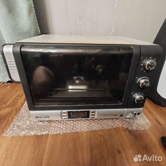 Духовка-хлебопечка delonghi