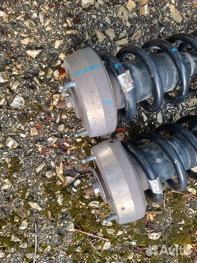 Передние стойки BMW e70 рестайлинг