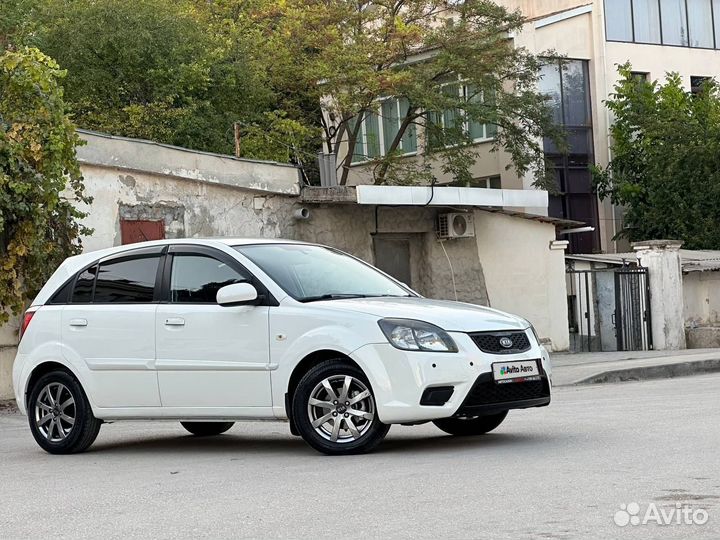 Kia Rio 1.4 AT, 2011, 140 900 км