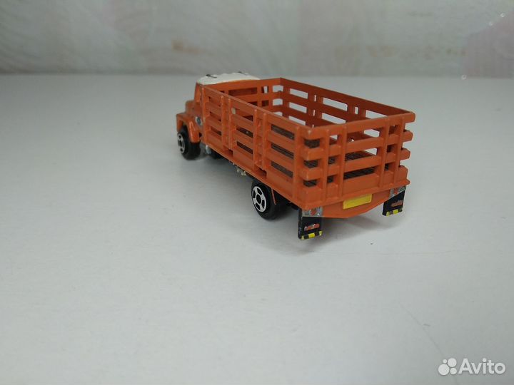 Грузовик американец высокий борт решетка