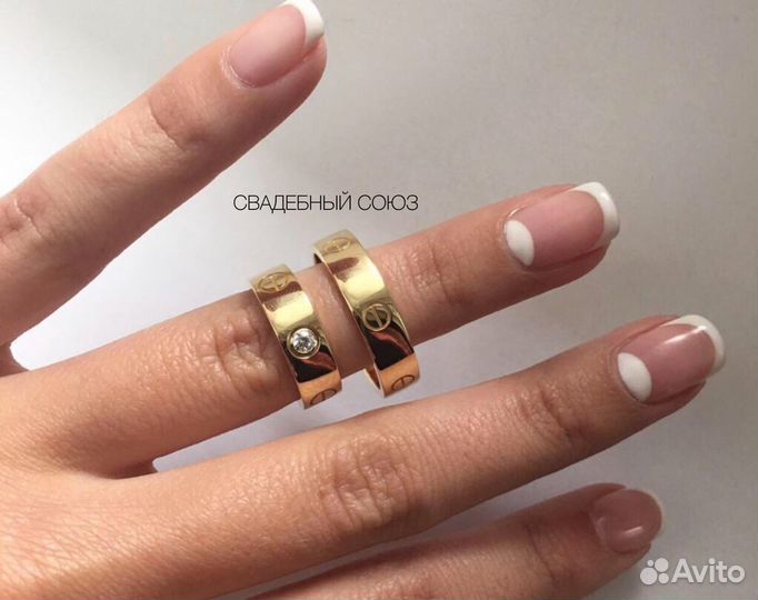 Золотые обручальные кольца с бриллиантом