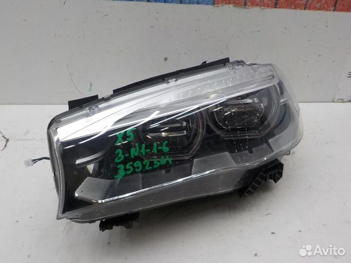 Фара левая BMW X5