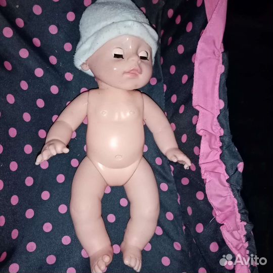 Куклы в люльке