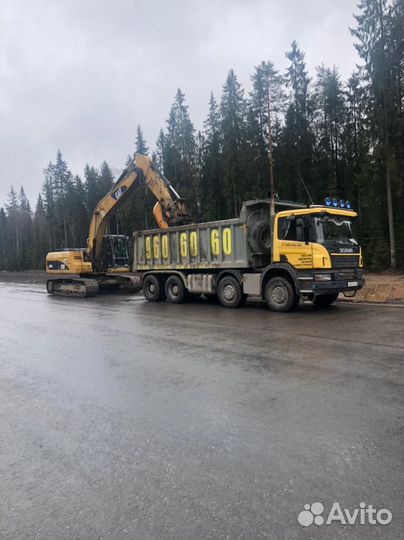 Водитель самосвала