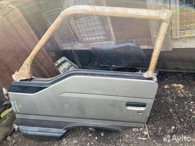 Передняя левая дверь Nissan Caravan