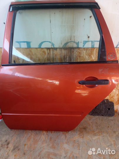 Дверь задняя левая Калина Универсал
