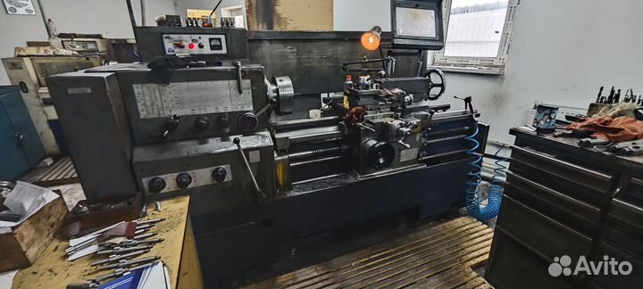 Токарь универсал