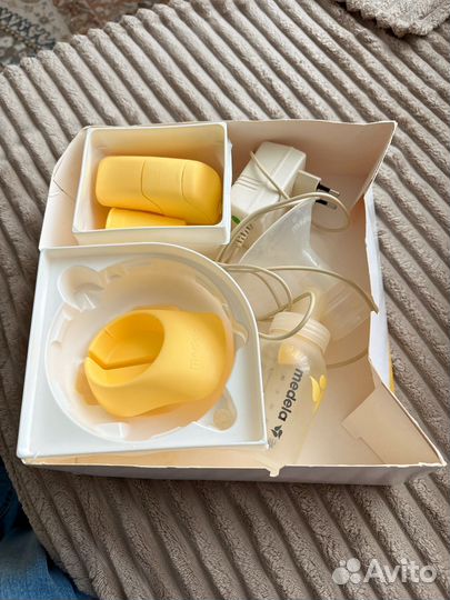 Молокоотсос medela электрический