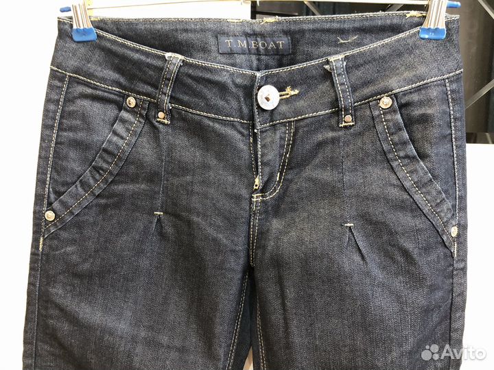 Джинсы клеш от бедра 42-44