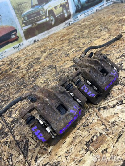 Суппорт задний Киа Спортейж 2