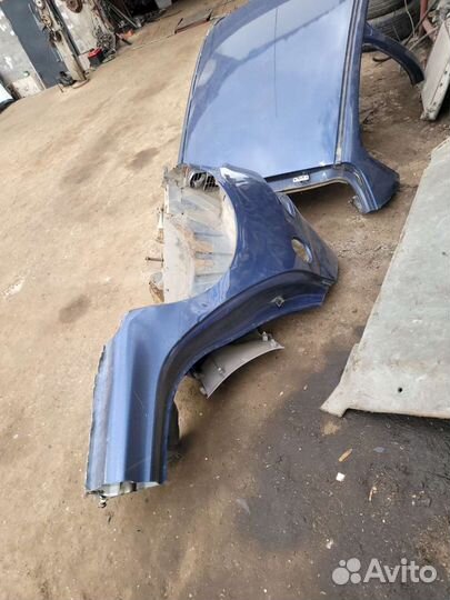 Заднее правое крыло на Пежо 206