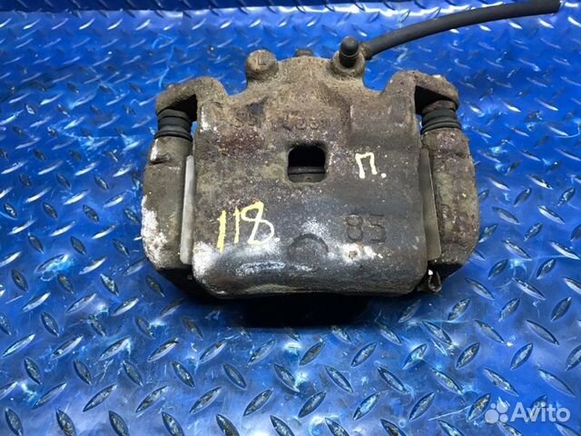 Тормозной суппорт передний левый Nissan Juke