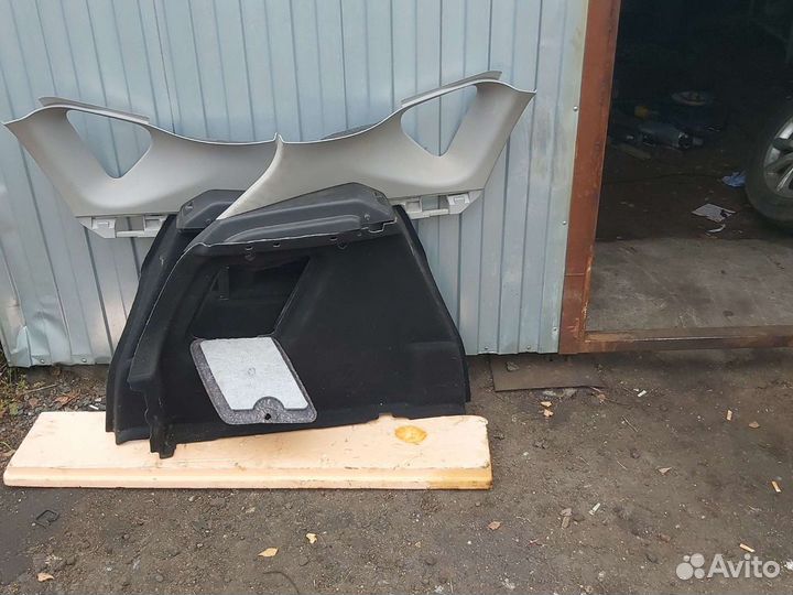 Обшивка багажника Opel Astra J