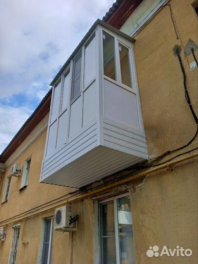 Пластиковые окна и балконы