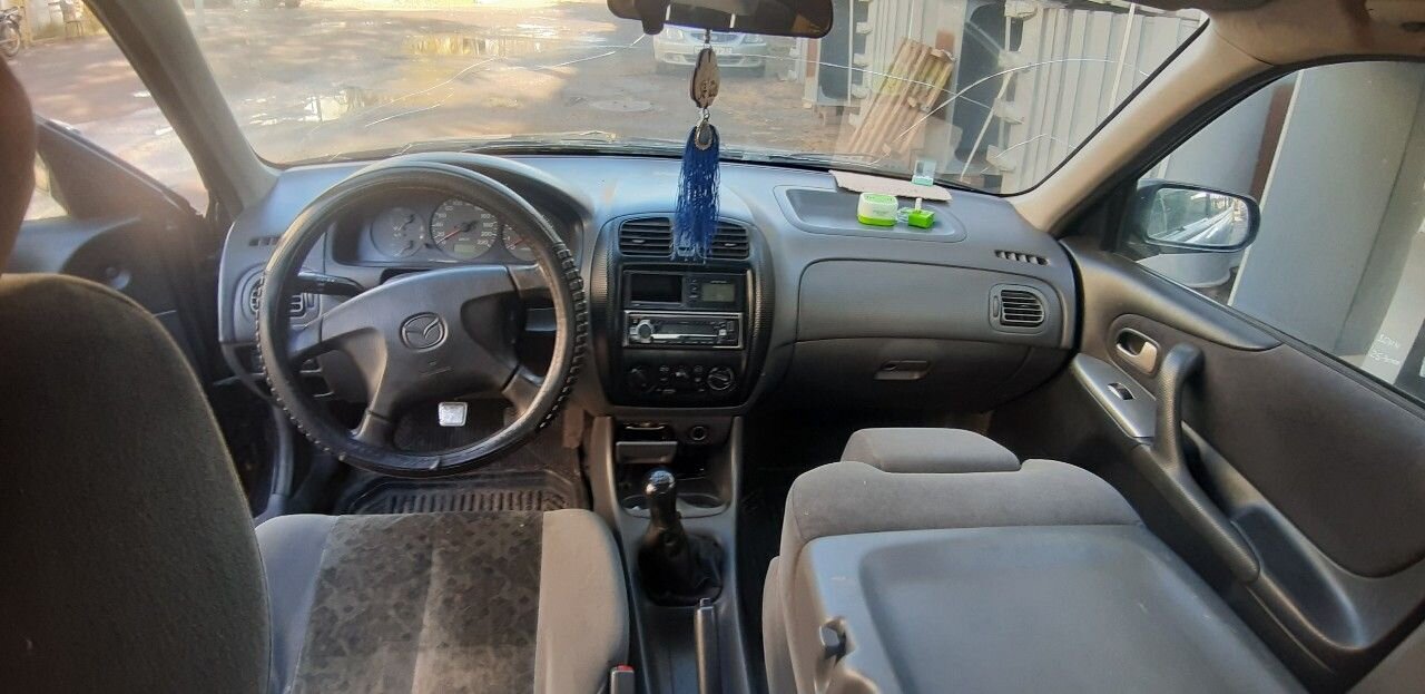 Mazda 323: фото владельца