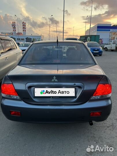 Mitsubishi Lancer 1.6 МТ, 2009, 199 129 км