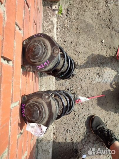 Стойка амортизатор передняя nissan tiida c11