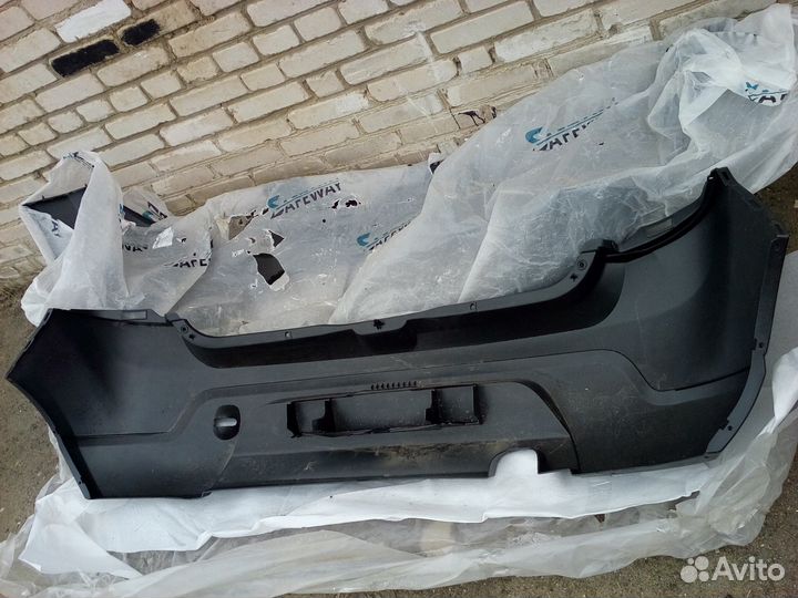 Sandero 2009-2014 задний бампер с трещиной