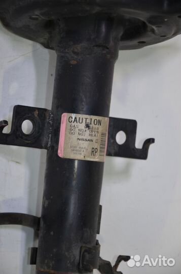 Стойка амортизатора передняя правая Nissan Qashqai