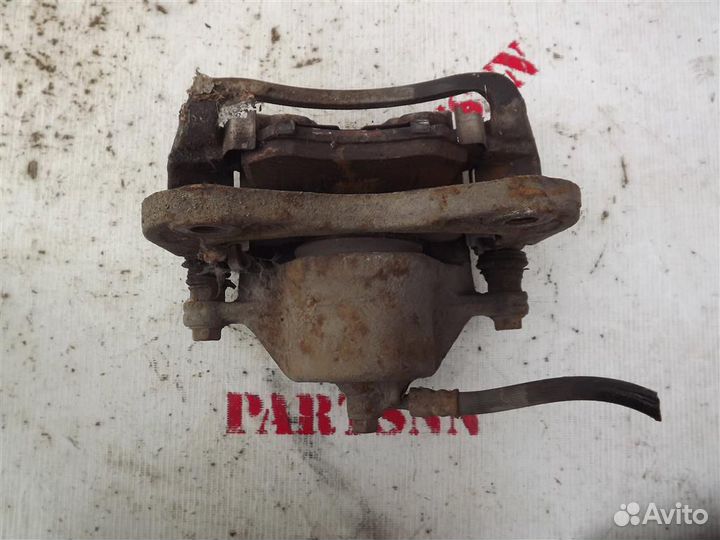 Суппорт передний левый Киа Спортаж 2