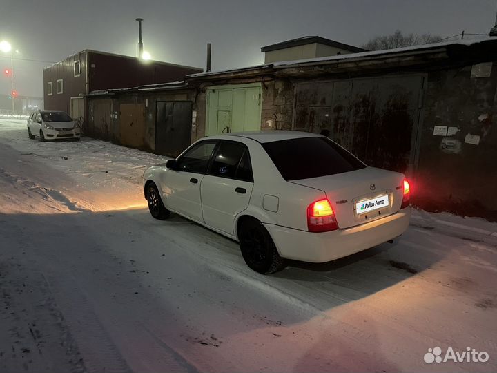 Mazda Familia 1.3 AT, 1999, 200 000 км