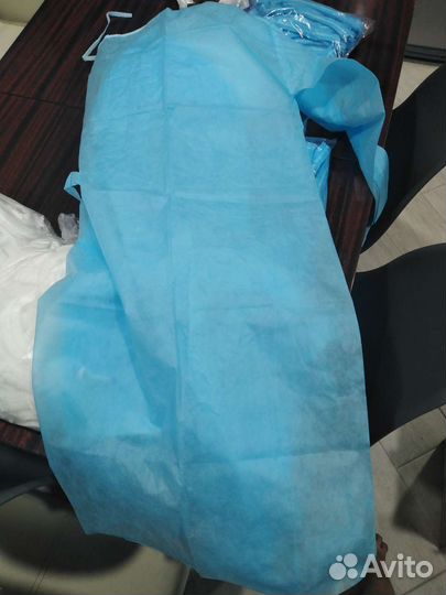 Халаты одноразовые