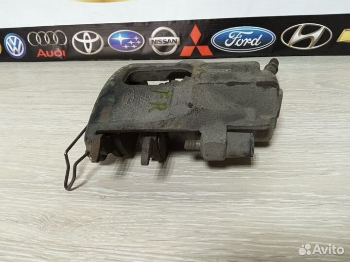 Суппорт тормозной передний правый Ford Focus MK1