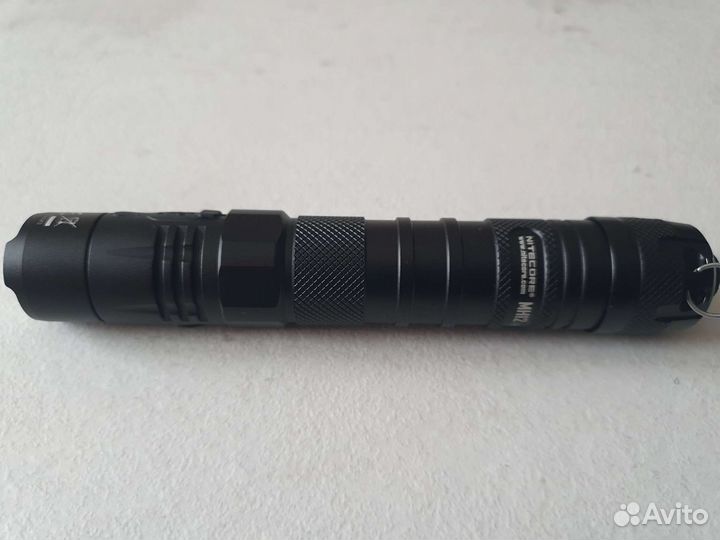 Тактический фонарь
