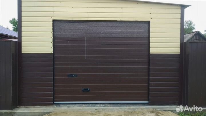 Высокие секционные ворота под ключ