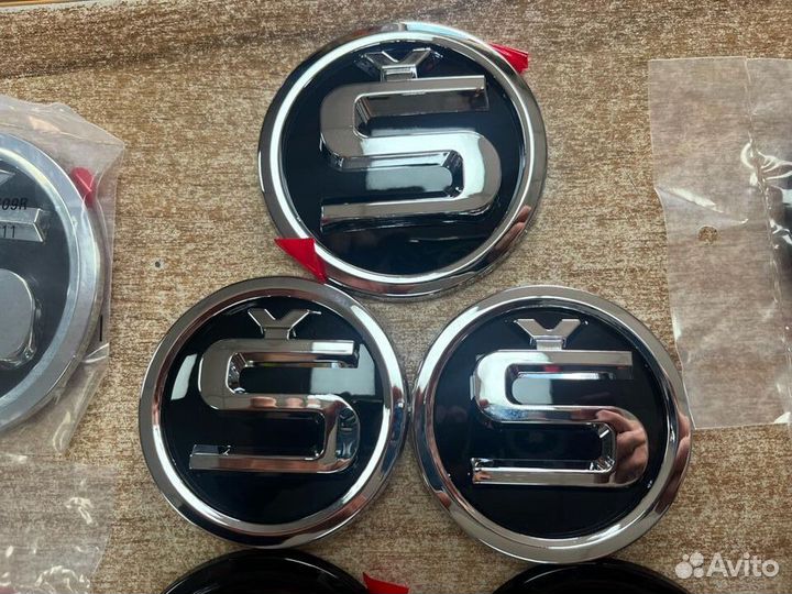 Эмблема Skoda нового образца S