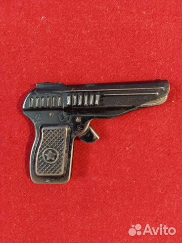 Игрушечный металлический пистолет