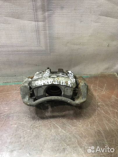 Суппорт передний правый Kia Cerato 3