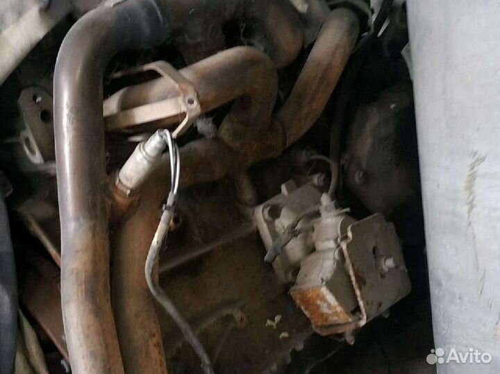 Коллектор выпускной саненг Муссо