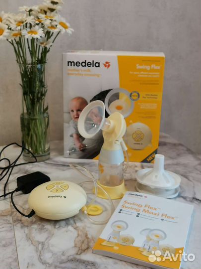 Молокоотсос medela swing flex