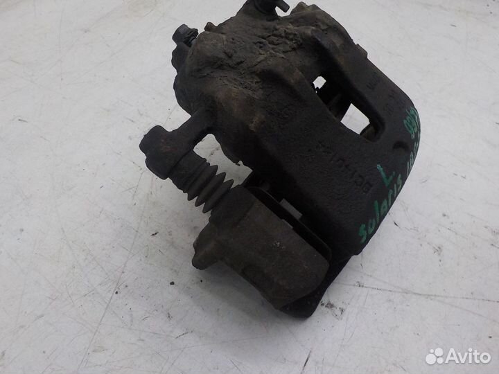 Суппорт тормозной передний левый Hyundai Solaris 2