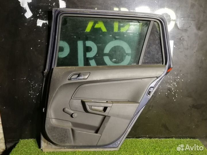 Обшивка двери задней правой Opel Astra H