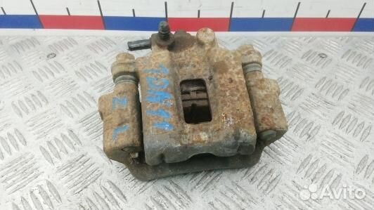 Суппорт тормозной задний левый mitsubishi pajero 4