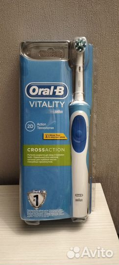 Новая электрическая зубная щетка Oral-B