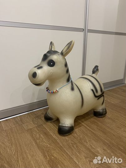 Детская игрушка качалка