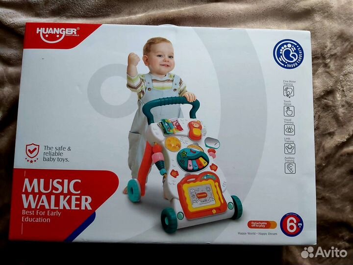 Музыкальная игровая каталка music walker huanger