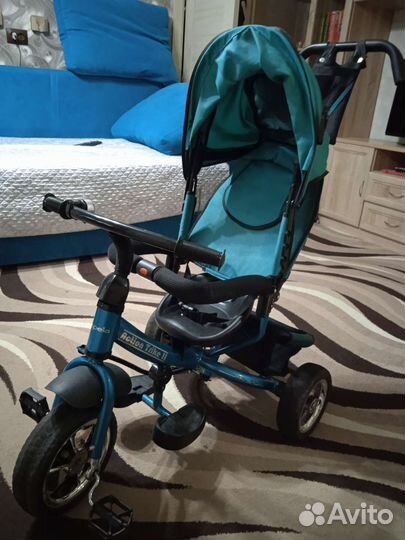 Трехколесный велосипед с ручкой