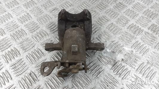 Суппорт тормозной задний левый renault megane 3 (1