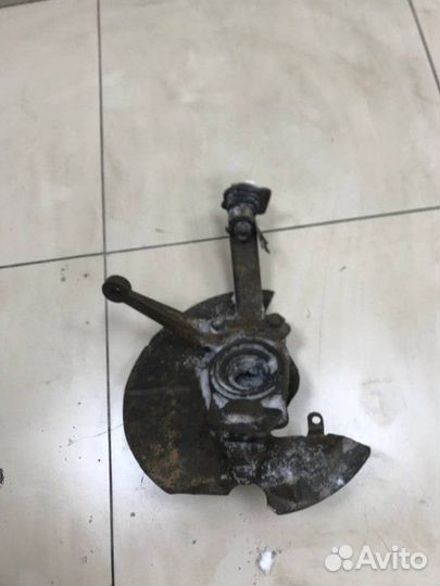 Кулак поворотный левый Chevrolet Niva