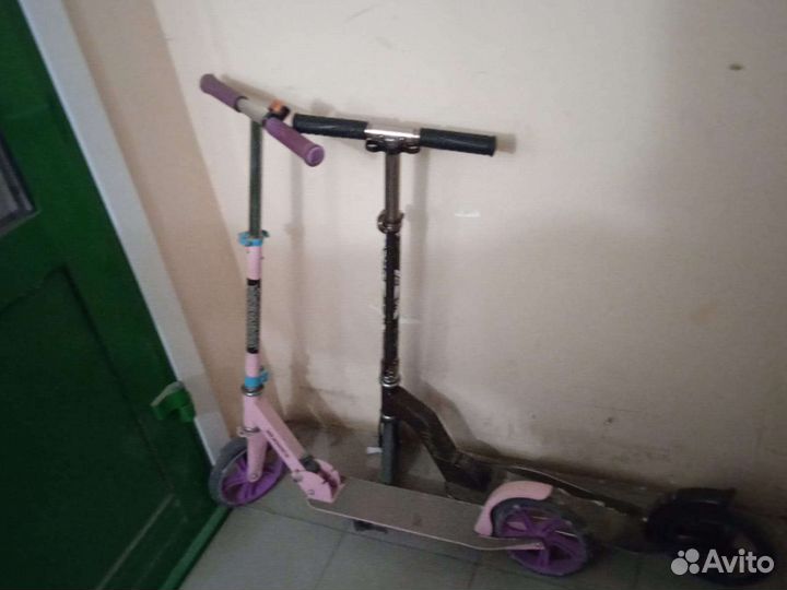 Самокат бу, на фото розовый